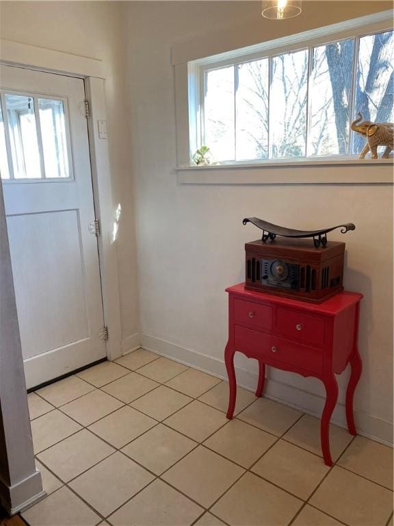 foyer with light tile patterned flooring