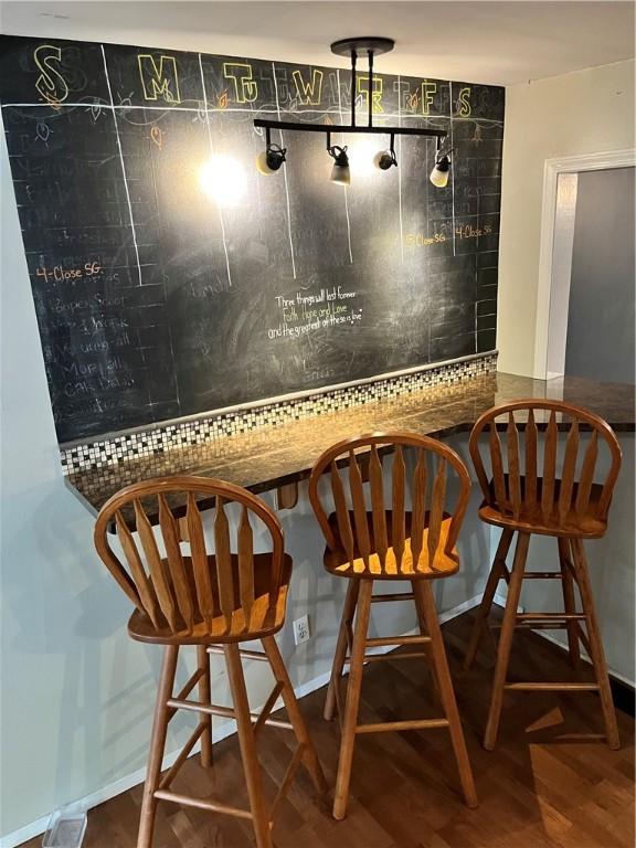 1021 W Hayes Ave, Charleston, IL 61920 - dining area featuring wood finished floors