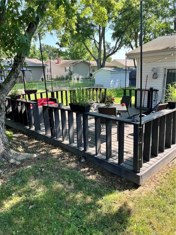 1021 W Hayes Ave, Charleston, IL 61920 - view of green lawn with a deck and a residential view
