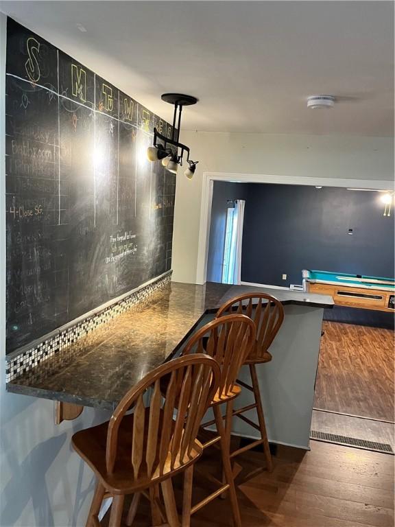 1021 W Hayes Ave, Charleston, IL 61920 - bar with wood finished floors and pool table