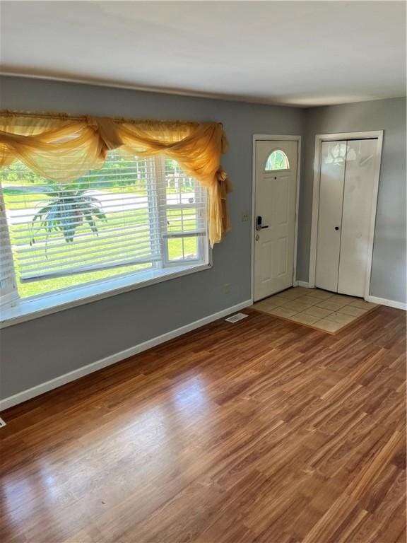 1021 W Hayes Ave, Charleston, IL 61920 - foyer entrance featuring baseboards and wood finished floors