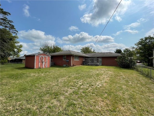 view of yard with a storage shed