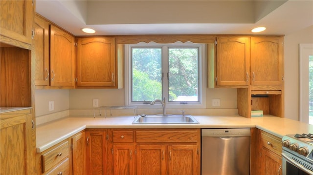 162 S Hillcrest Blvd, Decatur, IL 62522 - kitchen featuring stainless steel appliances, light countertops, brown cabinetry, and recessed lighting