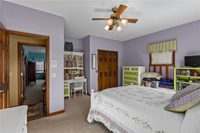 11284 E Lincolnshire Ln, Effingham, IL 62401 - bedroom featuring carpet floors, a closet, baseboards, and ceiling fan