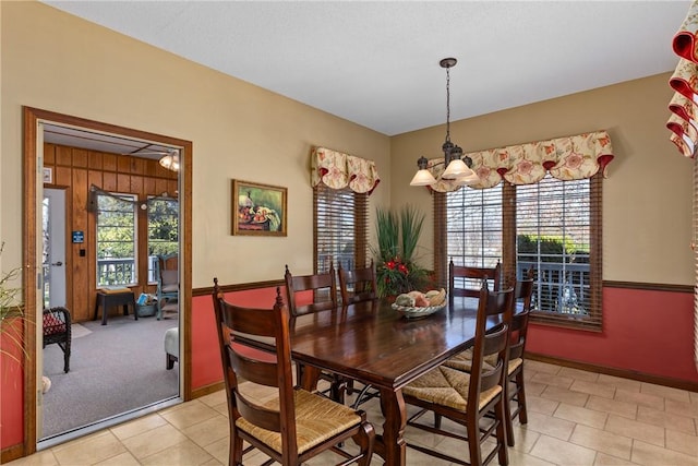 11284 E Lincolnshire Ln, Effingham, IL 62401 - dining space featuring baseboards, light carpet, and light tile patterned floors