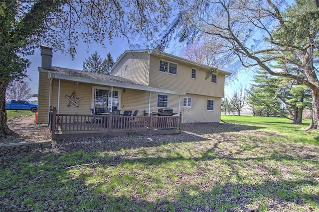 8070 Cerro Gordo Blacktop, Oakley, IL 62501 - back of house featuring a yard and a deck