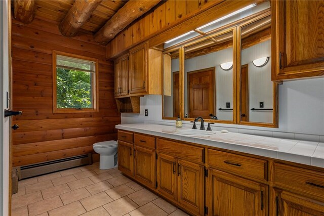 5446 N 1700th St, Dieterich, IL 62424 - bathroom with a baseboard heating unit, vanity, a wood ceiling with exposed beams, tile patterned flooring, and wooden walls