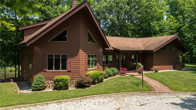 5446 N 1700th St, Dieterich, IL 62424 - chalet / cabin featuring a front lawn, roof with shingles, and a chimney
