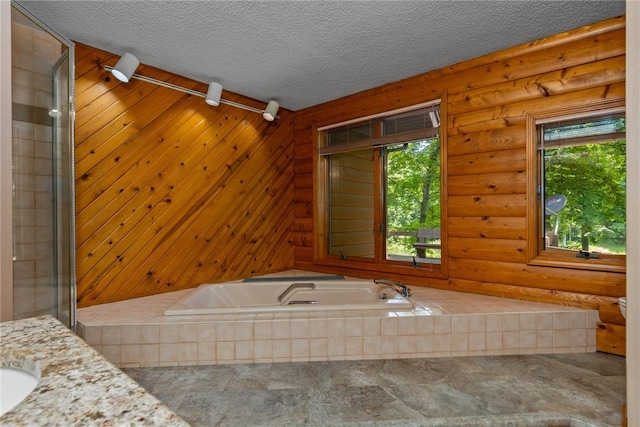 5446 N 1700th St, Dieterich, IL 62424 - full bath featuring healthy amount of natural light, a bath, vanity, and a textured ceiling