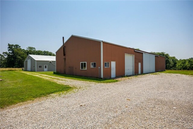 5446 N 1700th St, Dieterich, IL 62424 - view of pole building with a yard and driveway