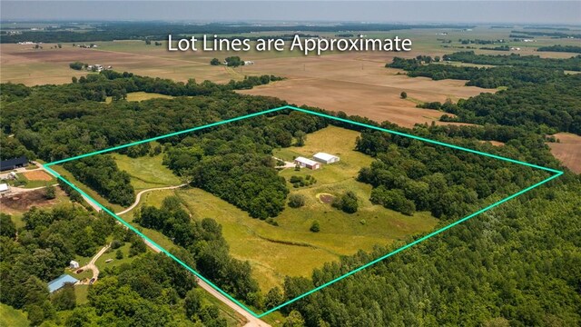 5446 N 1700th St, Dieterich, IL 62424 - aerial view of sparsely populated area with property parcel outlined and a forest
