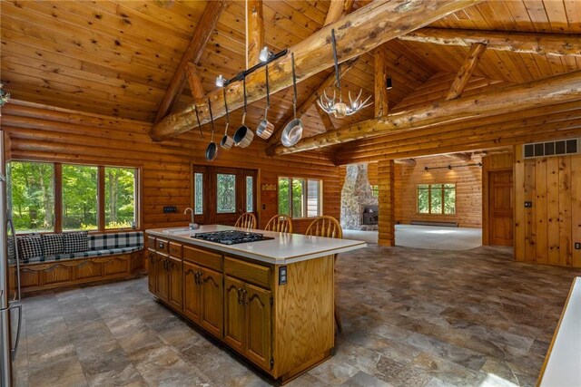 5446 N 1700th St, Dieterich, IL 62424 - kitchen featuring black gas stovetop, a wood ceiling with exposed beams, open floor plan, high vaulted ceiling, and light countertops