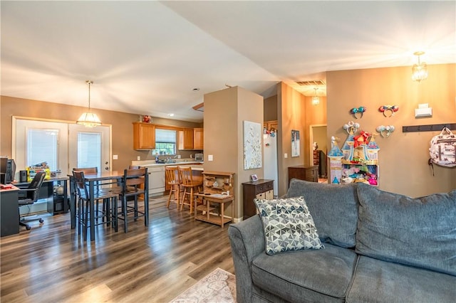 130 S Illinois St, Warrensburg, IL 62573 - living area with wood finished floors and vaulted ceiling