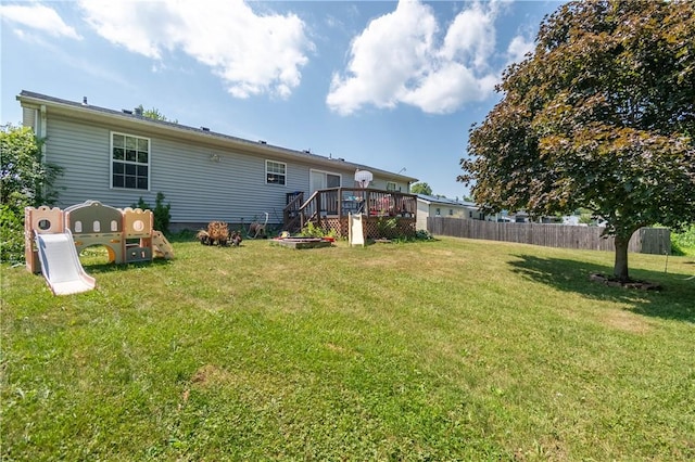 130 S Illinois St, Warrensburg, IL 62573 - rear view of house featuring a deck