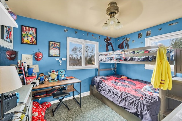 bedroom featuring carpet, a ceiling fan, and baseboards