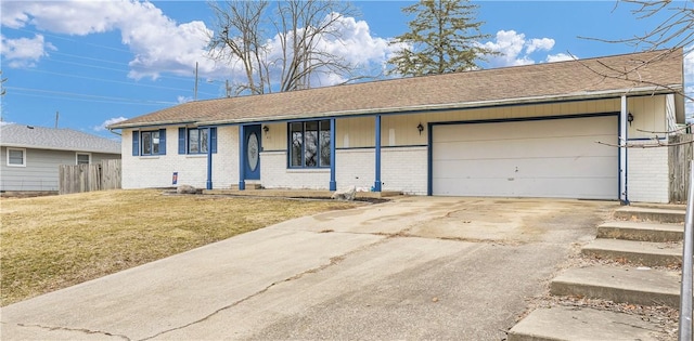 ranch-style home with driveway, an attached garage, fence, a front lawn, and brick siding