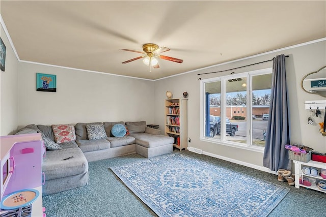 living room with ornamental molding, carpet flooring, ceiling fan, and baseboards