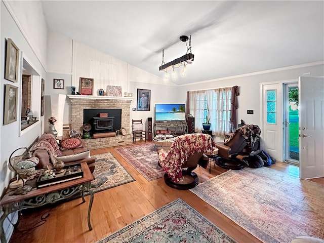 10 Rose Ln, Marshall, IL 62441 - living room with lofted ceiling, wood finished floors, and a wood stove