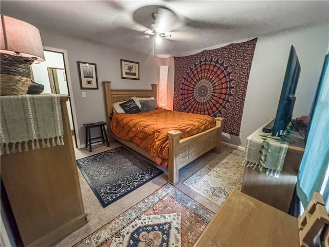 10 Rose Ln, Marshall, IL 62441 - bedroom with ceiling fan and a textured ceiling