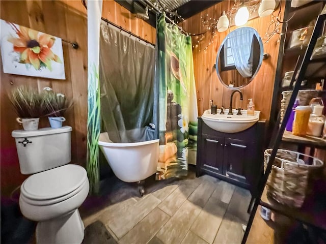 10 Rose Ln, Marshall, IL 62441 - bathroom with vanity, wood walls, and wood finished floors
