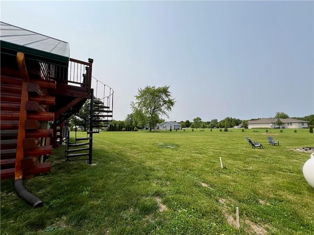 67 Shores, Sullivan, IL 61951 - view of grassy yard featuring stairway
