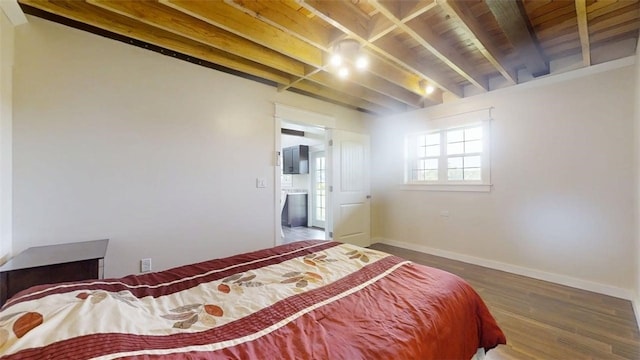 67 Shores, Sullivan, IL 61951 - bedroom with wood finished floors, baseboards, and wooden ceiling with exposed beams