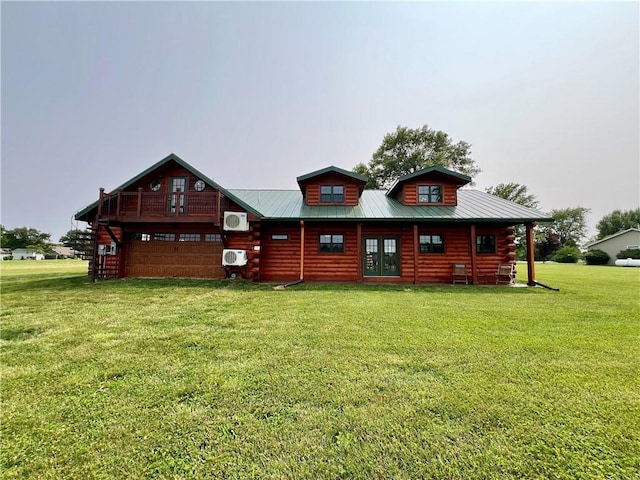 67 Shores, Sullivan, IL 61951 - back of property with a lawn, log siding, and metal roof