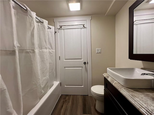 67 Shores, Sullivan, IL 61951 - bathroom with wood finished floors, vanity, toilet, and shower / bath combination with curtain