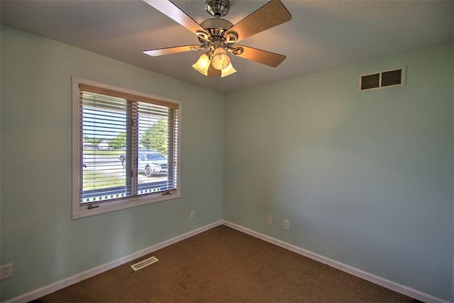 8898 Country Side Dr, Dalton City, IL 61925 - unfurnished room with dark carpet and ceiling fan