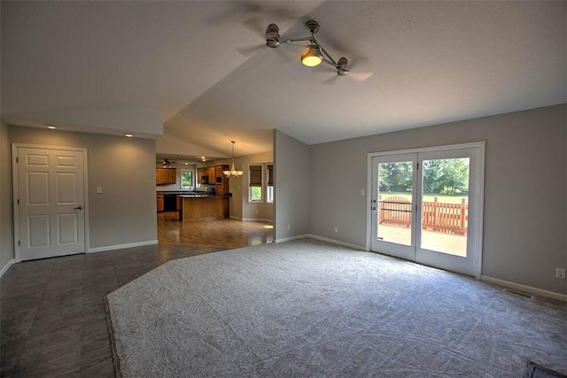 8898 Country Side Dr, Dalton City, IL 61925 - unfurnished living room featuring ceiling fan, lofted ceiling, and dark colored carpet