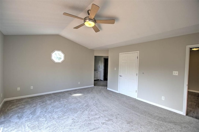 8898 Country Side Dr, Dalton City, IL 61925 - unfurnished bedroom featuring carpet flooring, lofted ceiling, and a ceiling fan