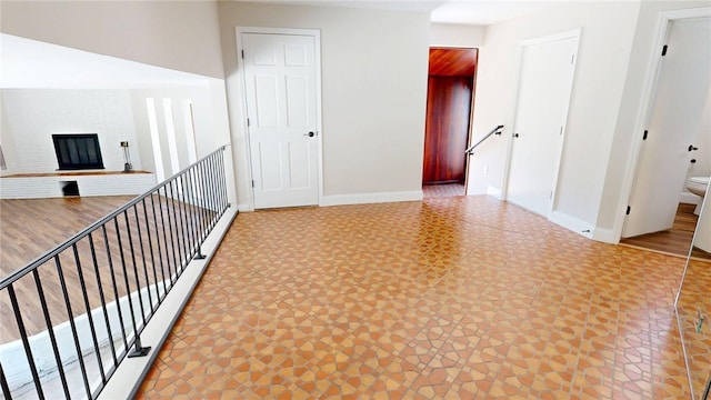 2550 Ivy Ln, Decatur, IL 62521 - hall with baseboards and an upstairs landing