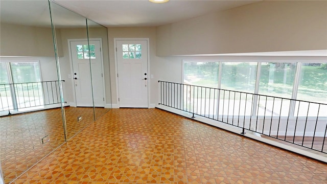 2550 Ivy Ln, Decatur, IL 62521 - entrance foyer with baseboard heating and baseboards