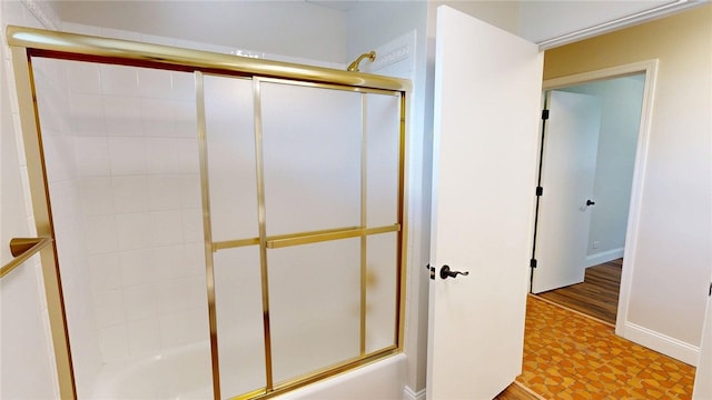 2550 Ivy Ln, Decatur, IL 62521 - full bathroom with enclosed tub / shower combo and baseboards