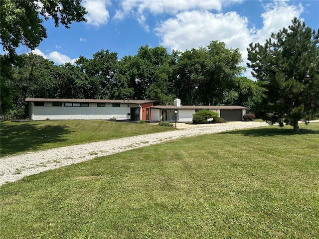 2550 Ivy Ln, Decatur, IL 62521 - view of front of property featuring a front lawn and a chimney