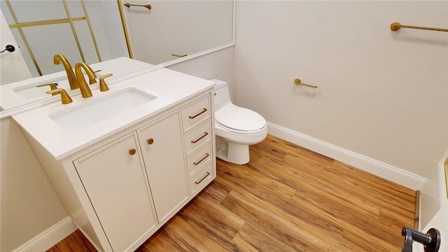 2550 Ivy Ln, Decatur, IL 62521 - full bath with vanity and wood finished floors