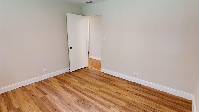 2550 Ivy Ln, Decatur, IL 62521 - unfurnished room featuring light wood-style floors and baseboards