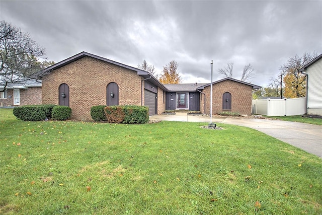 ranch-style house with a front yard and a garage