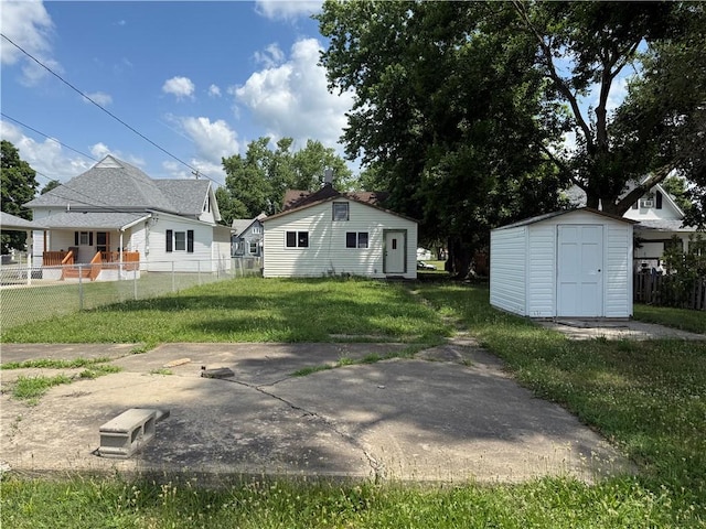 116 Warrington Ave, Danville, IL 61832 - view of yard featuring a storage unit