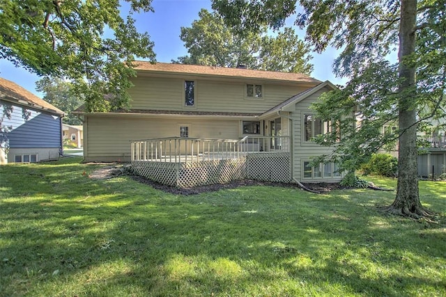 664 N Antler Dr, Mt Zion, IL 62549 - back of house featuring a deck and a lawn