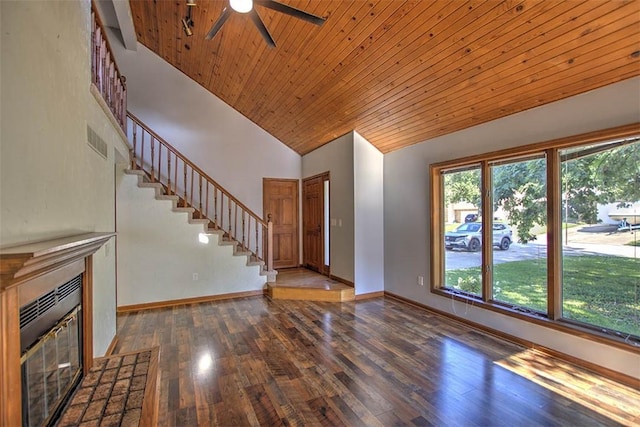 664 N Antler Dr, Mt Zion, IL 62549 - unfurnished living room with a ceiling fan, stairway, wood finished floors, a glass covered fireplace, and wood ceiling