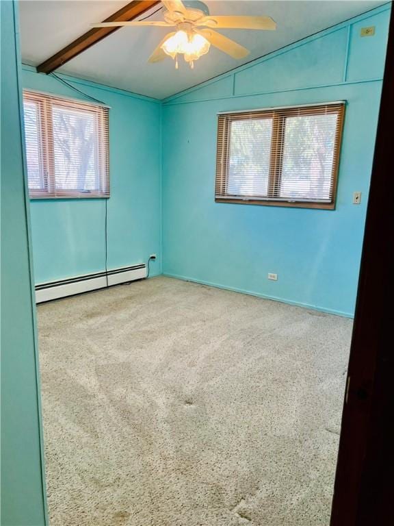 carpeted spare room featuring a ceiling fan, lofted ceiling with beams, and baseboard heating