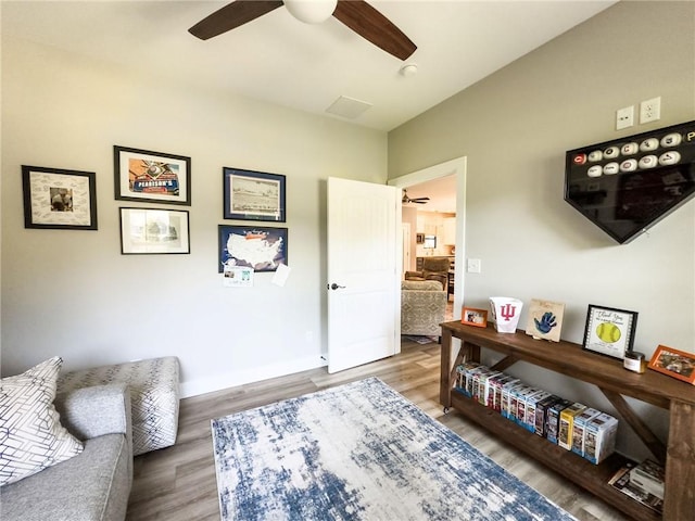 3 Wood Ridge Ln, Marshall, IL 62441 - living area with ceiling fan and wood finished floors