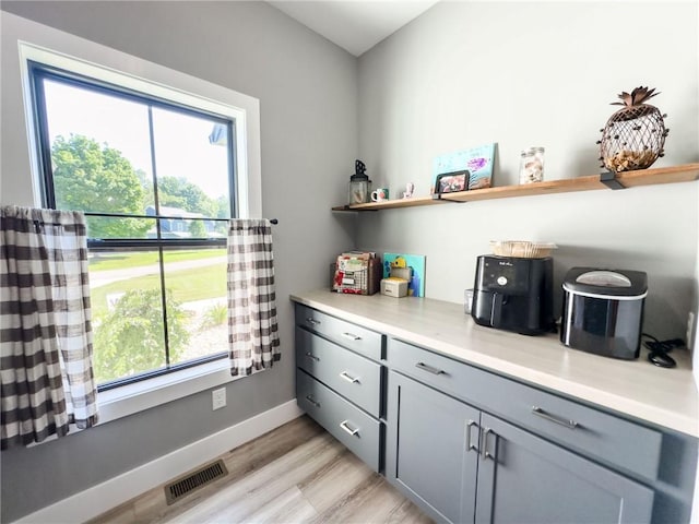 3 Wood Ridge Ln, Marshall, IL 62441 - bar area featuring healthy amount of natural light and light wood-style flooring