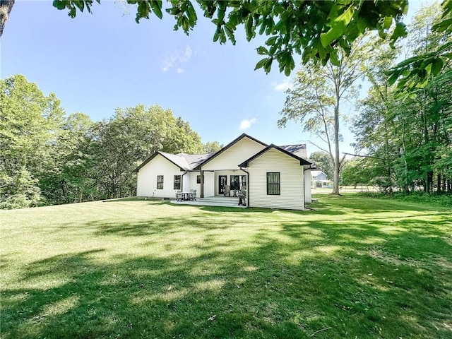 3 Wood Ridge Ln, Marshall, IL 62441 - rear view of house with a yard and a patio area