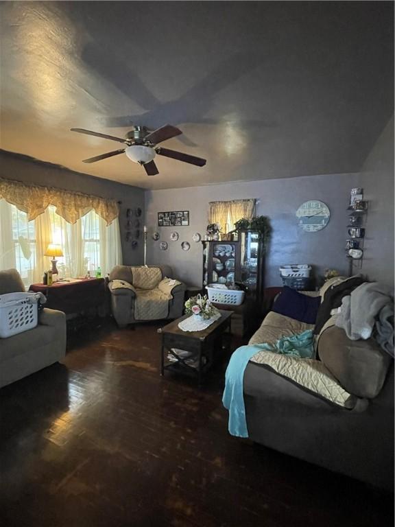 living room featuring ceiling fan