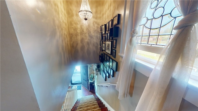 1805 N Gilbert St, Danville, IL 61832 - stairway featuring an inviting chandelier and wood finished floors