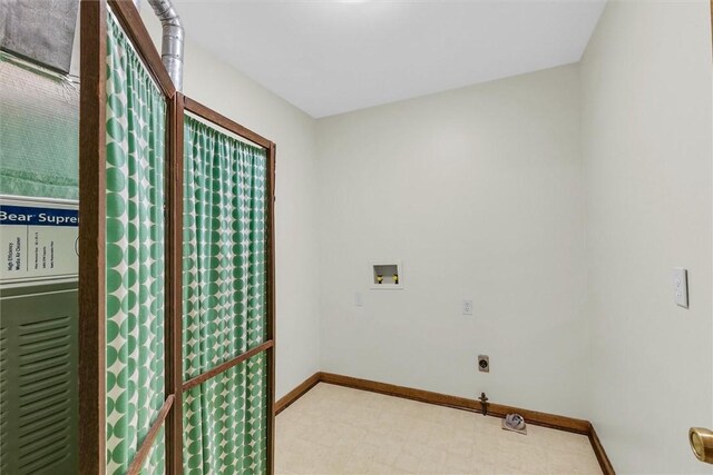 946 Foxcrest Dr, Charleston, IL 61920 - washroom featuring washer hookup, tile patterned floors, and hookup for an electric dryer