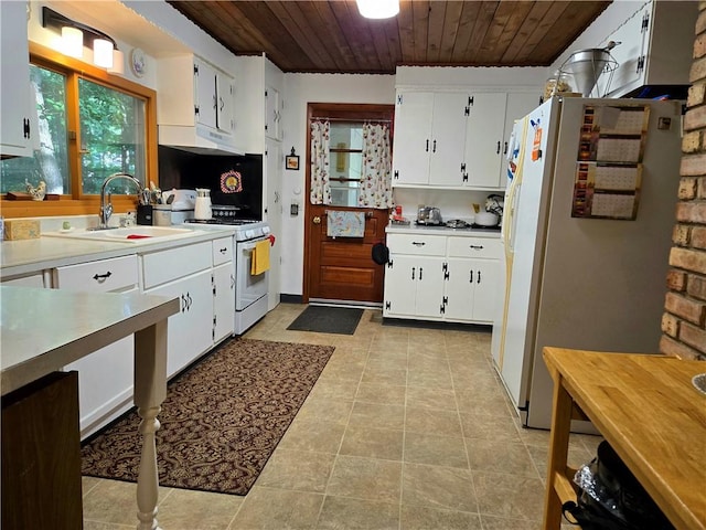 14317 N 920 E Rd, Fairmount, IL 61841 - kitchen with white appliances, wood ceiling, light countertops, white cabinetry, and under cabinet range hood