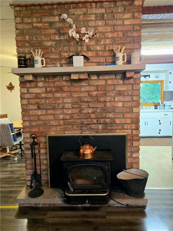 14317 N 920 E Rd, Fairmount, IL 61841 - detailed view of a wood stove and wood finished floors